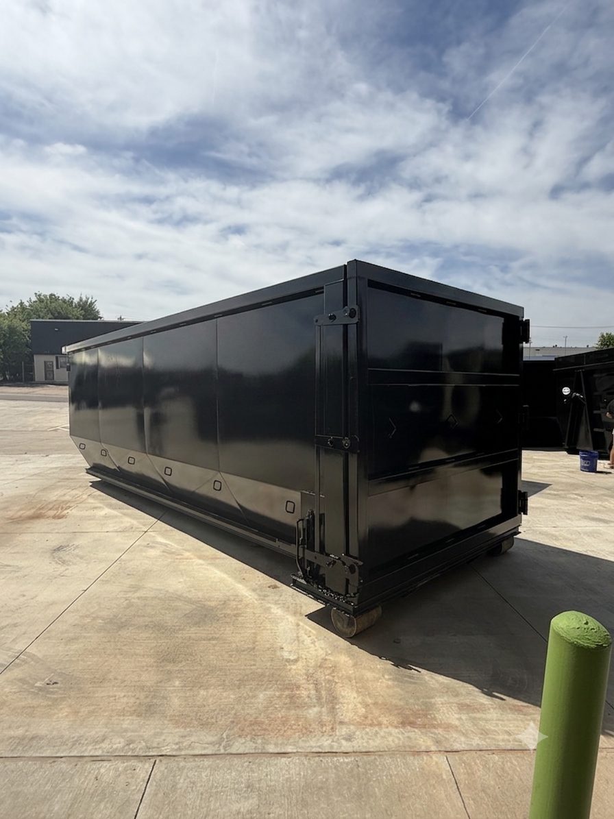 Black roll-off dumpster ready for delivery in OKC